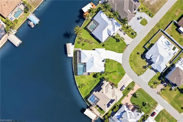 From above, the beauty of this waterfront property truly shines with stunning canal vistas in every direction.