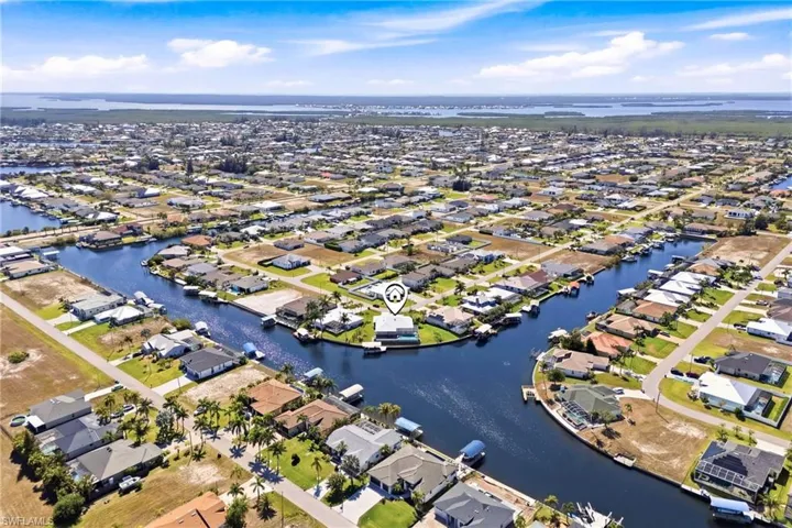 Breathtaking aerial perspective showcasing expansive intersecting canal views and direct Gulf-access boating.