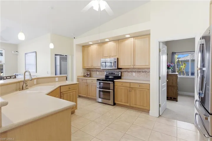 A spacious kitchen designed for both everyday living and effortless entertaining.