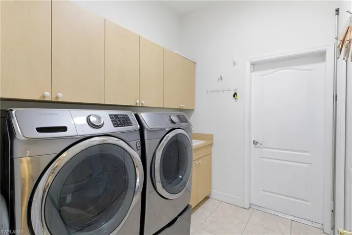 Well-designed laundry room with generous storage and everyday convenience.