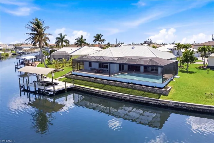A true Florida dream home featuring resort-style outdoor living and breathtaking waterfront scenery.