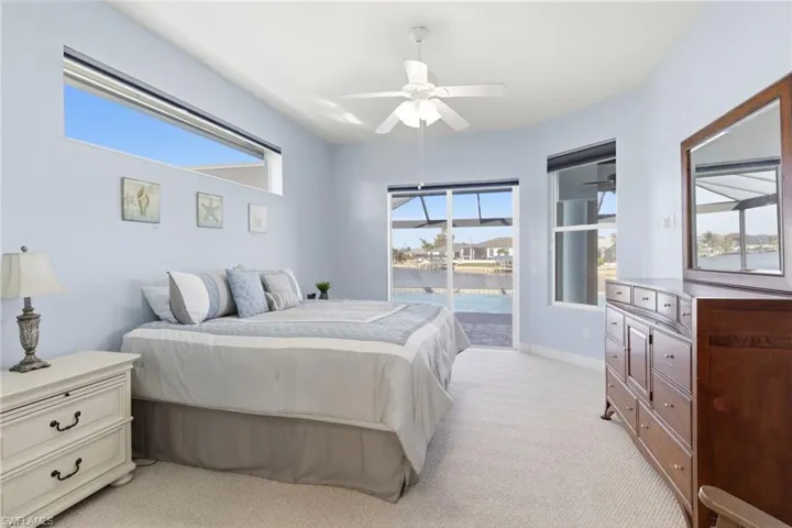 A luxurious private retreat featuring lanai access and breathtaking waterfront views.