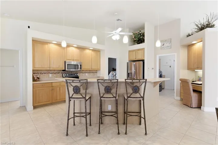 Thoughtfully designed kitchen with plenty of room for preparing meals and hosting guests.