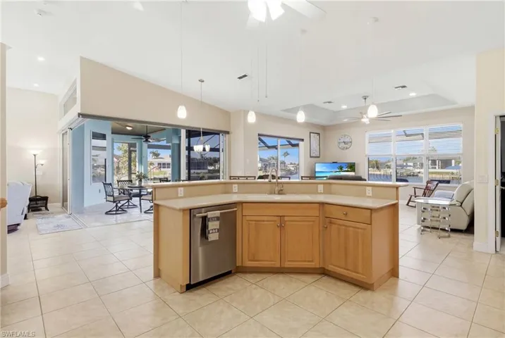The heart of the home, offering ample space to cook while enjoying nearby water views.