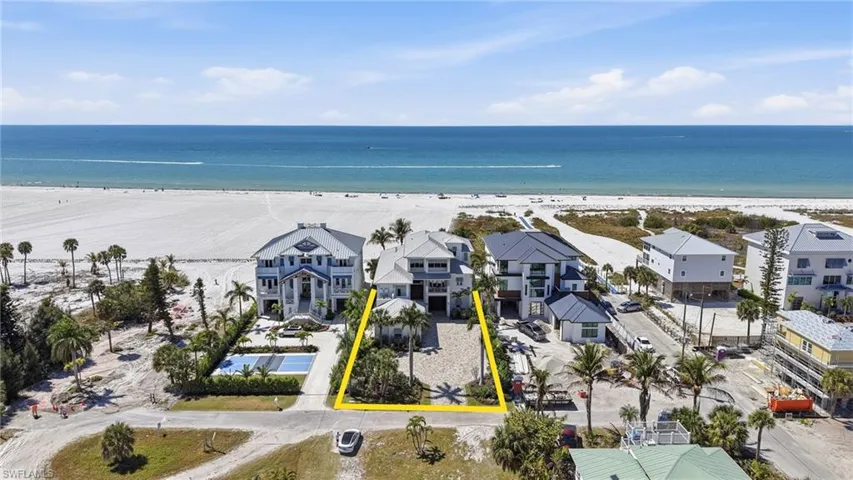 Aerial overview of property's location featuring extended coastline and property parcel outlined - Virtually Edited Image