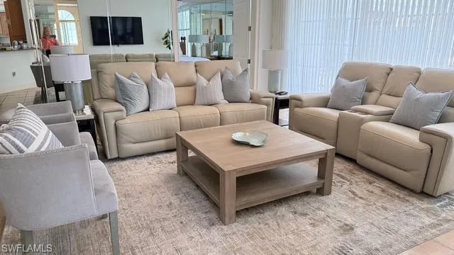 Modern comfortable furnishings grace the open living/dining room
