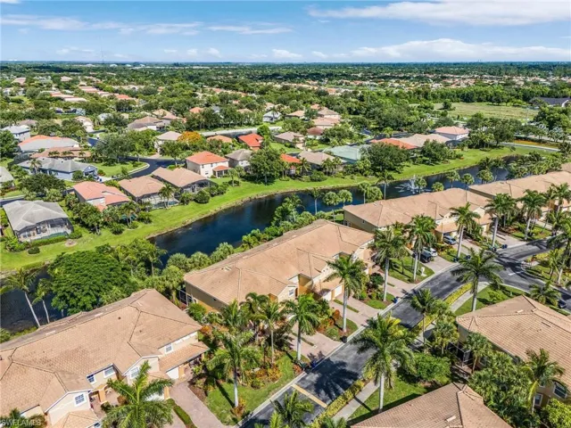 Aerial view of residential area with a nearby body of water