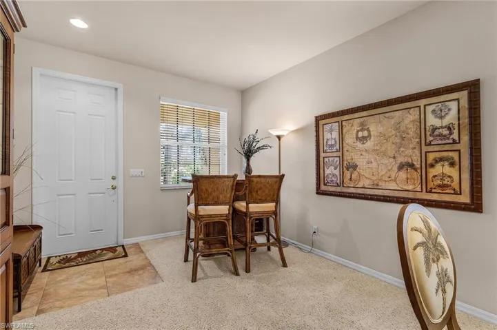 Dining area featuring carpet flooring and recessed lighting