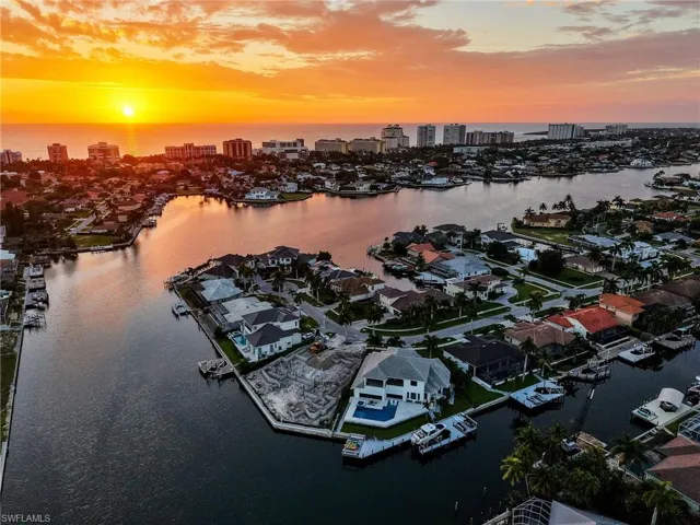 View of urban area with a large body of water and nearby suburban area