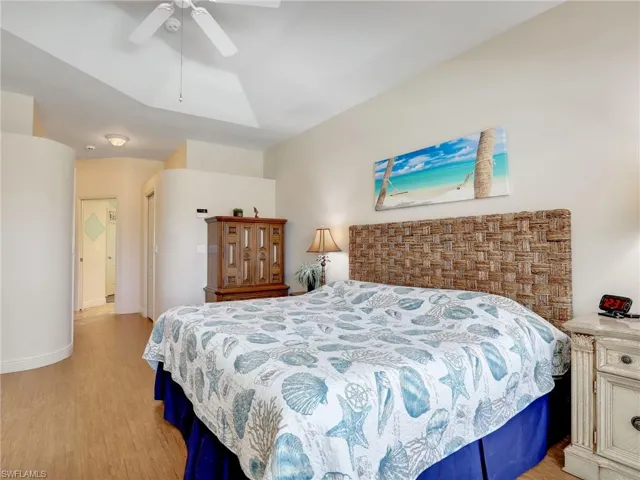 Bedroom featuring light wood-style flooring and a ceiling fan