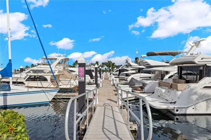 Dock area featuring a water view