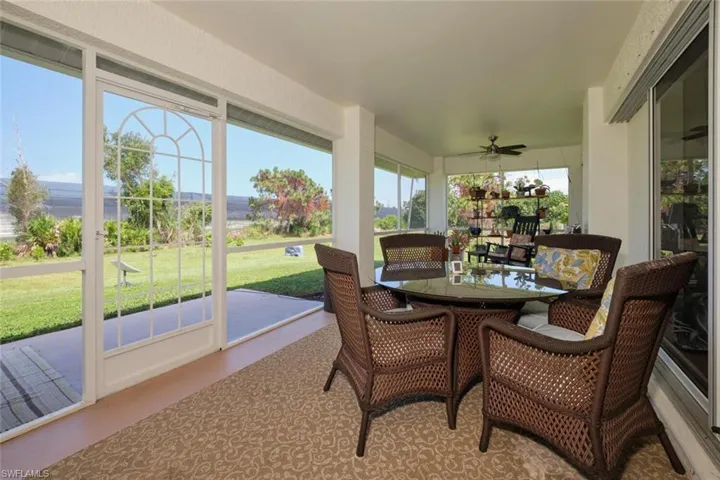 Screened lanai with room for entertaining and catching the beautiful sunsets.
