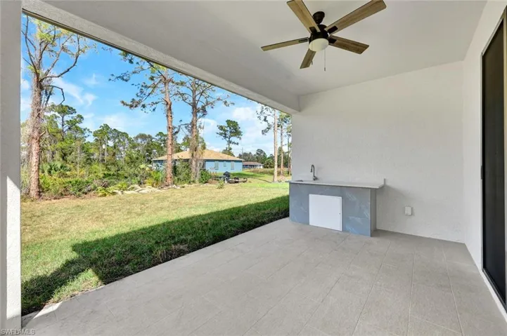 View of patio / terrace featuring a ceiling fan