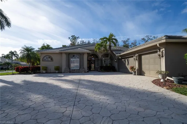 Single story home with a garage