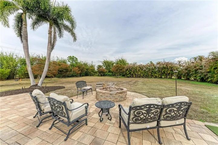 View of patio / terrace with an outdoor fire pit