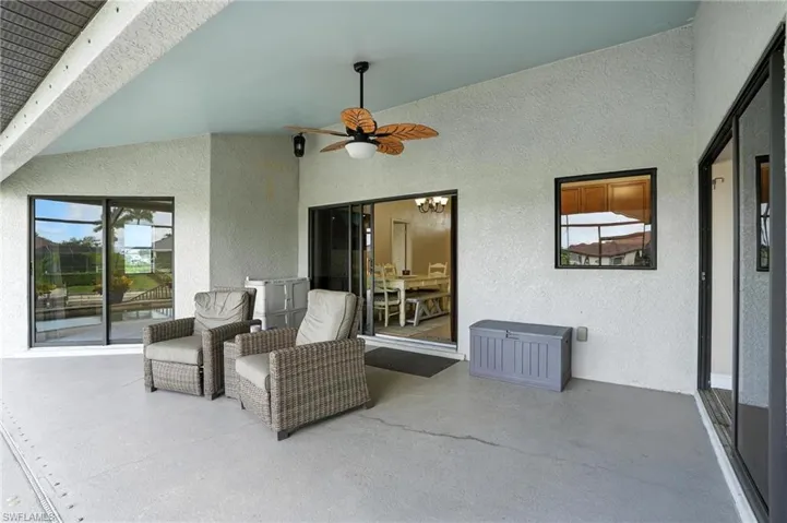 View of patio featuring a ceiling fan