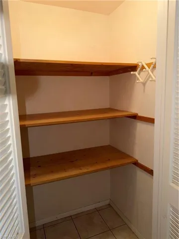 Storage area featuring radiator heating unit