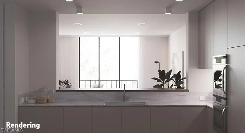 rendering showing kitchen opened to living room