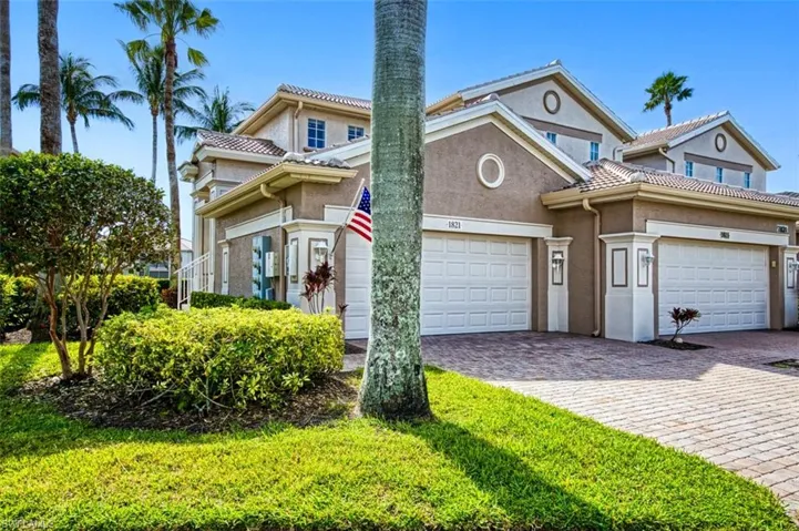 View of front facade featuring a garage