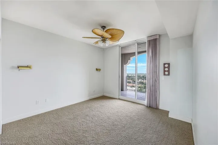 Bedroom 2 w/ Sliders to East Balcony