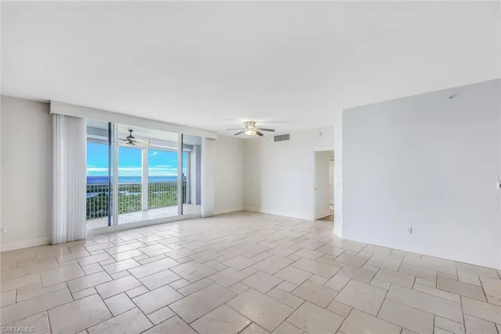 Great Room w/ Wall of Sliders to Gulf View Lanai