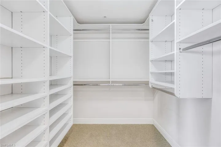 Two Walk-In Wardrobes w/ Custom Built-Ins