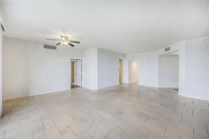 High Ceilings & Neutral Decor Throughout