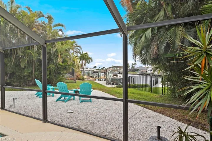 Unfurnished sunroom with a water view