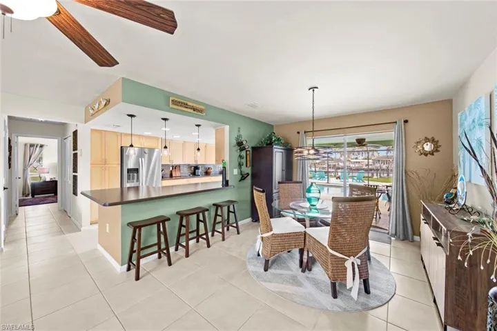 Tiled dining area with ceiling fan