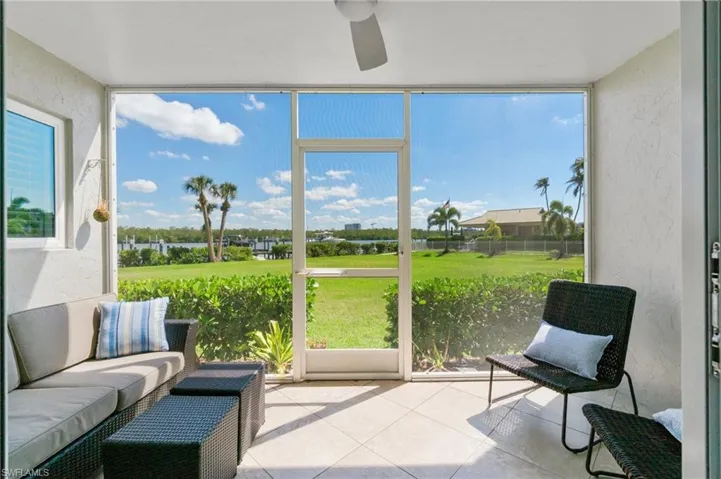 Screened Lanai - walk right out to lawn, pool, and deeded dock-boat