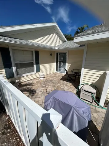 View of paved front courtyard