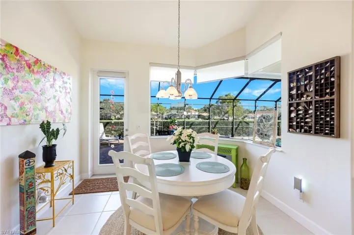 A very large and Spacious primary bedroom featuring tray ceilings, soft ambient lighting, and large windows for natural light.