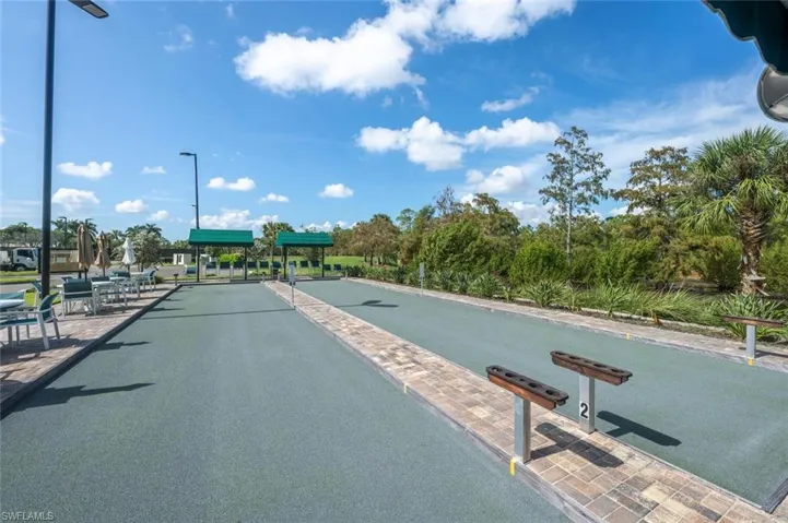 View of property's community with a game area
