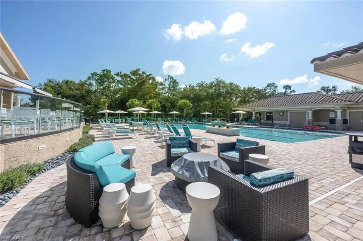 Community pool with a patio area