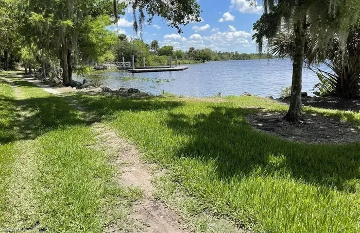 Water view with a floating dock