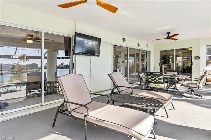 View of patio / terrace with ceiling fan and outdoor dining space