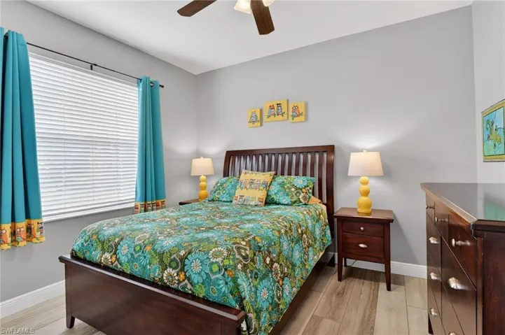 3 Bedroom featuring laminate floors and ceiling fan