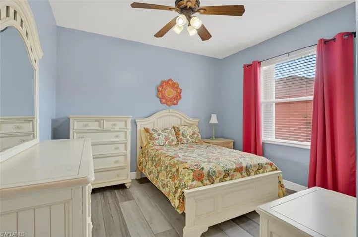 2 Bedroom featuring laminate flooring and a ceiling fan