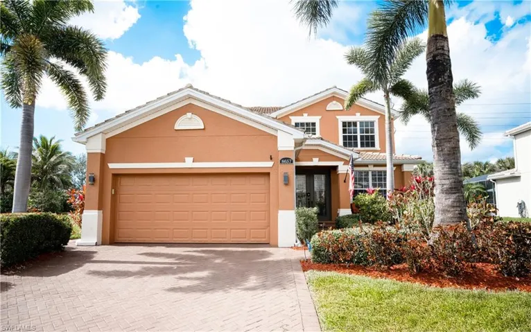 View of front of property with a garage