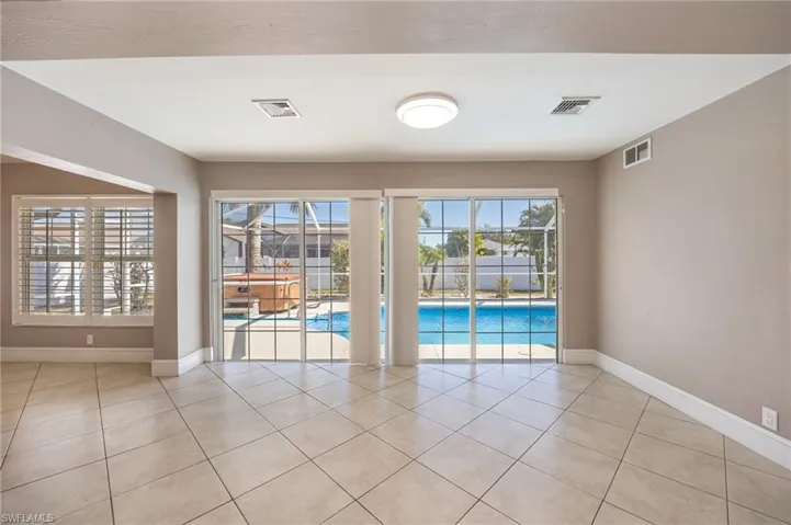 Living room featuring light tile patterned floors