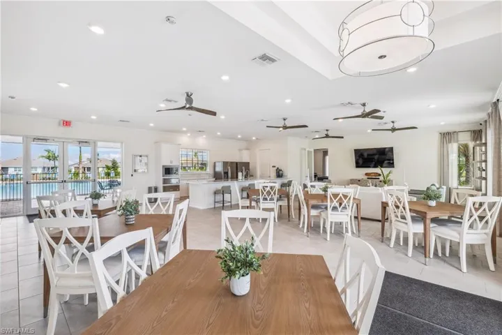 Dining space featuring light tile patterned floors