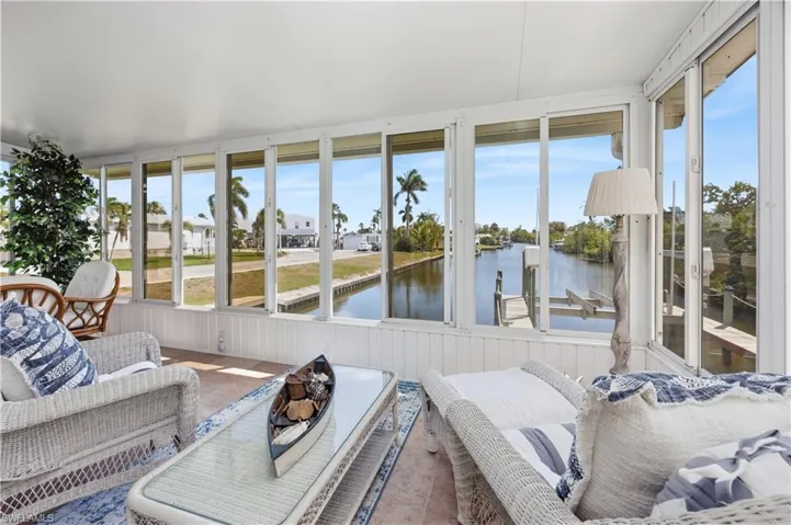 Enclosed lanai with panoramic canal views