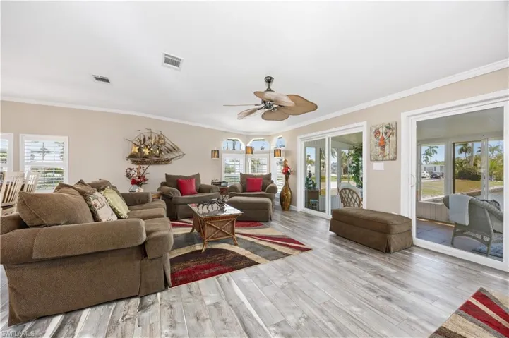 Spacious living area with natural light and lanai access