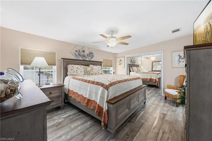 Spacious primary bedroom with natural light and large closet