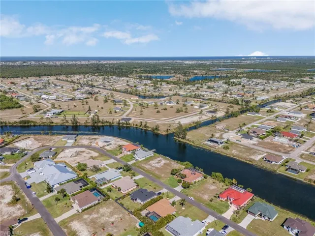 Aerial view with a residential view and a water view