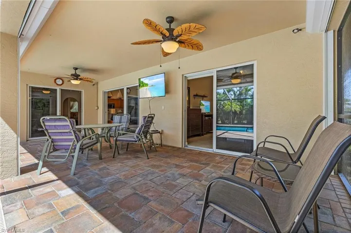 View of patio featuring ceiling fan and outdoor dining space