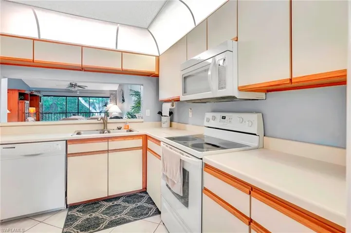 240  Pebble Beach  CIR, Naples, FL 34113
