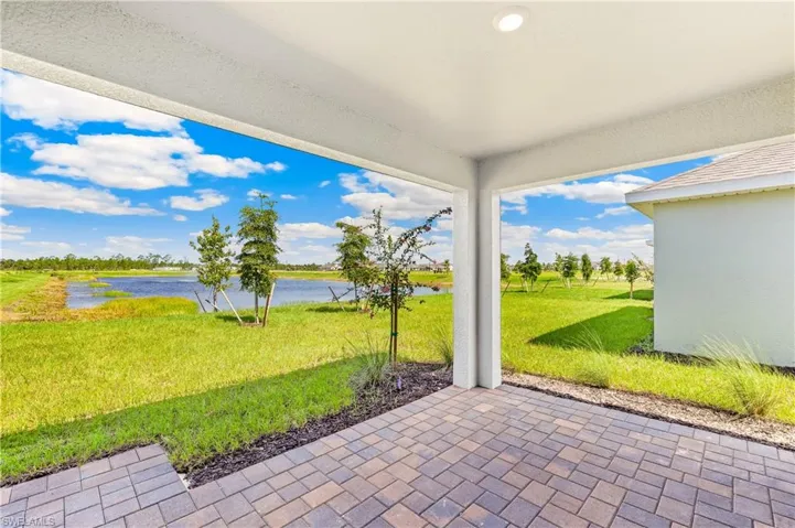 View of patio / terrace featuring a water view