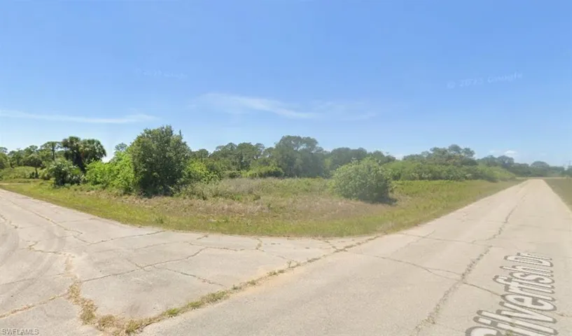 View of asphalt street featuring a rural view