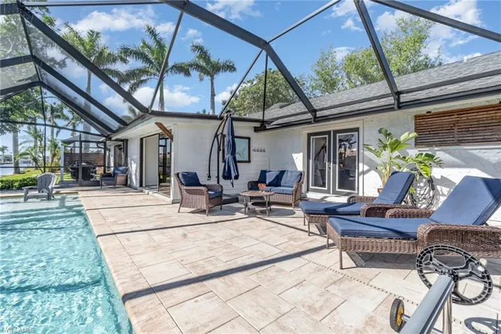 View of enclosed lanai and pool area